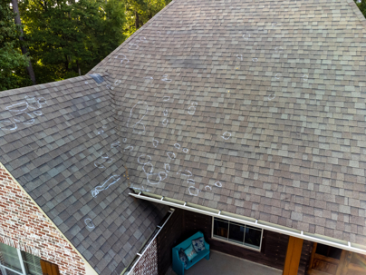 asphalt roof with hail damage